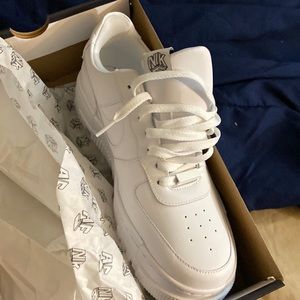 Size 12 white woman’s 12 mens 10.5 AF1
